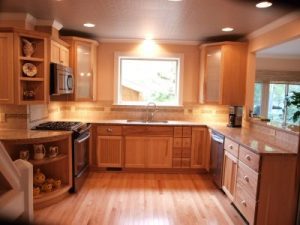 view of a gorgeous remodeled kitchen with wood cabinetry
